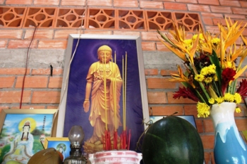 Bị tai nạn chết đi sống lại nhờ bức tranh Phật  A Di Đà?